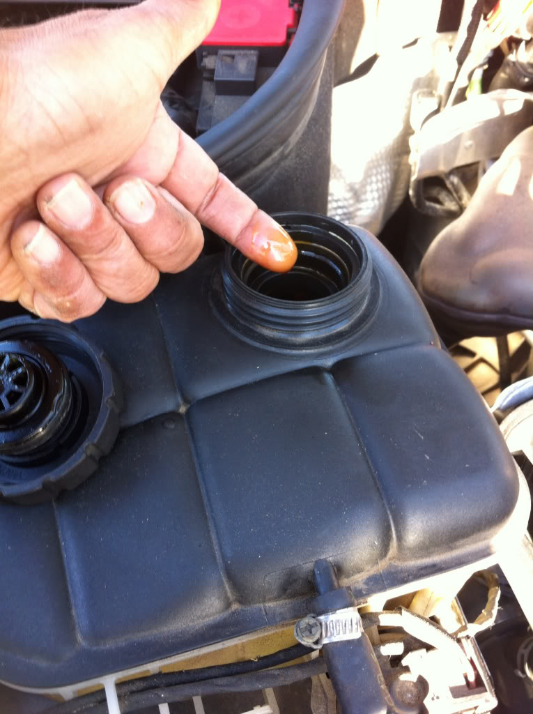 engine oil in coolant causes