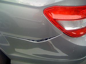 Dent on my C300 - Paying out of pocket vs using insurance to fix it.-sideview.jpg