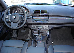 How many people would get a Carbon Fiber Interior?-x5-black-cf-installed-full-dash-center-view-768.jpg