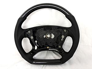 UPGRADE CLS WOOD INTERIOR PIECES INTO REAL CARBON SET-cls63-carbon-steering-wheel.jpg
