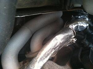 I just bought a 2006 C55 AMG... what do the factory exhaust manifolds look like?-image.jpeg