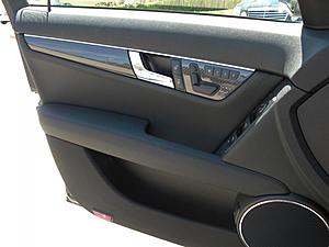 Anyone have a C63 with Factory Carbon fiber Package???-front-door.jpg