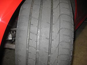 Tires wearing very uneven in various spots-img_1508.jpg