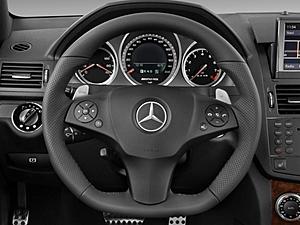Steering Wheel-2010-mercedes-benz-c63-amg-4-door-sedan-6-3l-amg-rwd-steering-wheel_100312119_l.jpg