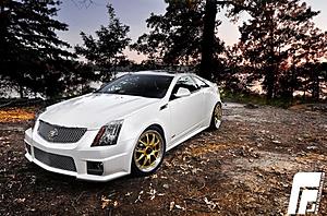 c63 coupe vs cts-v coupe-white-caddy.jpg