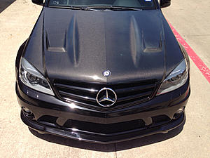 Looking at a c63 with a carbon fiber hood?-image-3179386015.jpg