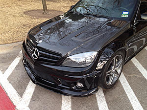 Looking at a c63 with a carbon fiber hood?-image-3653653551.jpg