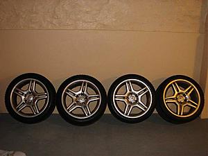 OEM E55 rims, mint condition with snow tires-4wheels.jpg