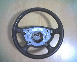 211 tail lights and wood steering wheel-wheel.jpg