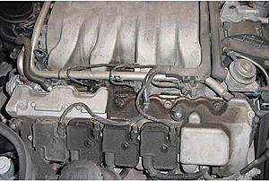 Oil leak on top, fouling coil, need repair advice.-oil-leaks-valve-cover-2.jpg