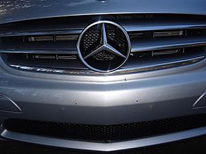 W209 (aftermarket) bi-xenon lights coming soon....-screw-holes.jpg