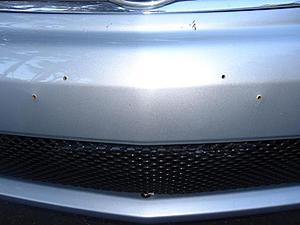 W209 (aftermarket) bi-xenon lights coming soon....-screw-holes-zoomed-up.jpg