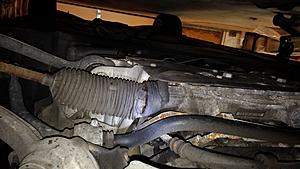 torn steering boot, how to replace?-torn-boot.jpg