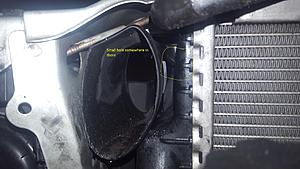 Belt snapped, water all over left front corner of engine bay-radiator.jpg