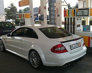 Joining the club-pumping-gas.jpg
