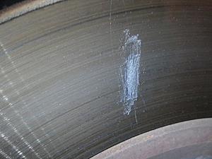 2012 E550 - Warped rotars for the SECOND TIME-scraped-rotor.jpg