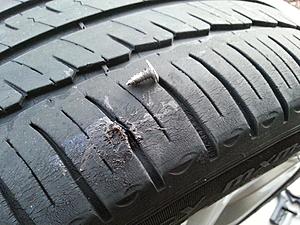 #&amp;*% nail in tire-20140504_200153.jpg