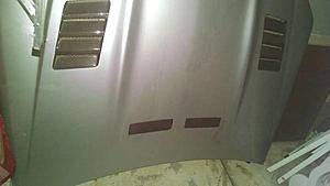 w204 C63 carbon fiber hood damaged-front.jpg