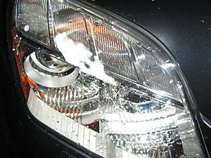 Condensation in the front turning signal areas-img_5472.jpg