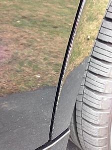 Paint chipping, rear door area.-image.jpg