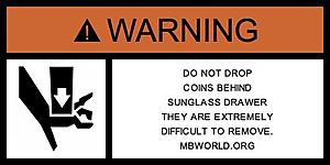 sunglass drawer will not close-warninglabel.jpg
