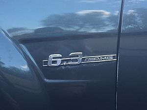 2009 c63 amg-badge.jpg