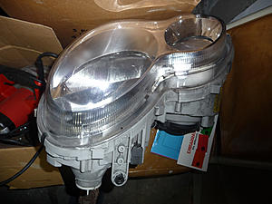 Parting out car FS: emblem, headlight, cd changer magazine-driver_top.jpg