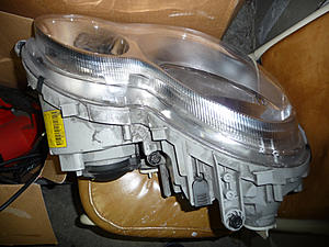 Parting out car FS: emblem, headlight, cd changer magazine-passenger_top.jpg