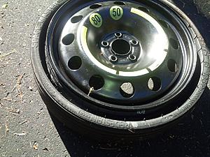 compact spare... it does work and is cool!-spare-deflated.jpg
