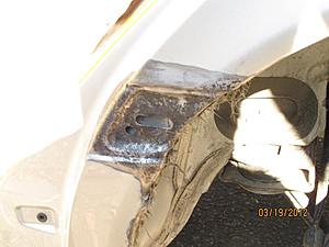 Ongoing Maintenance and Repair for a 2003 S600.-r003-rust-bubbles-fenders-door-frame-12.jpg