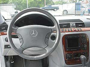 What is this button?-steering-wheel.jpg