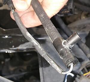 That pesky windshield washer tank leak-bmv09fbl.jpg