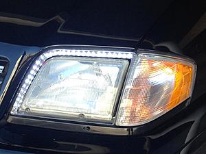 Right Front headlight trim ring-img_9802.jpg