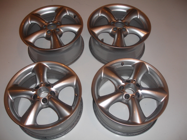 a set of 4 used stock Mercedes-Benz 17" staggered 5-spoke wheels (NO T...