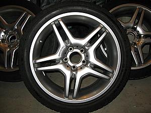 E55 AMG wheels with rubber for sale-front-wheel-1.jpg