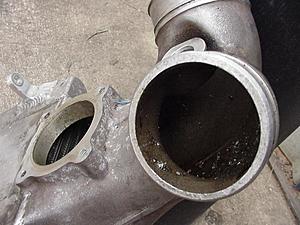 What happened to this 55 motor?!-intake-tube-side.jpg