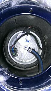 start to smell fuel when car idles for to long, inside and outside. cls55-imag0831.jpg