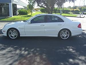2004 E55 AMG Kompressor Benz White/Black Panoramic Roof etc .9k or open to trades-benzfrontleft004.jpg