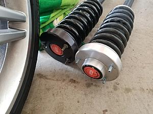 Anyone with the arnott air to coil conversion ....-shocks4.jpg