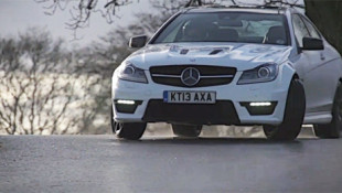 Watch the C63 AMG Drift Enough to Burn through a Mountain of Tires