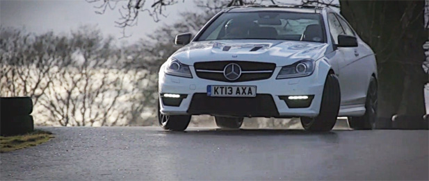 Watch the C63 AMG Drift Enough to Burn through a Mountain of Tires