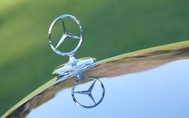 Mercedes-Benz Hood Ornament and Reflection