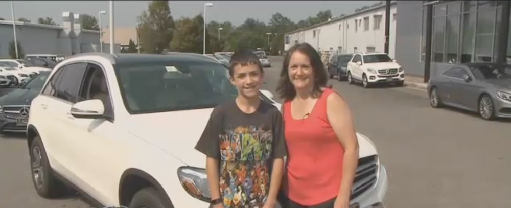 Pam Raines and son with their new Mercedes-Benz GLC.